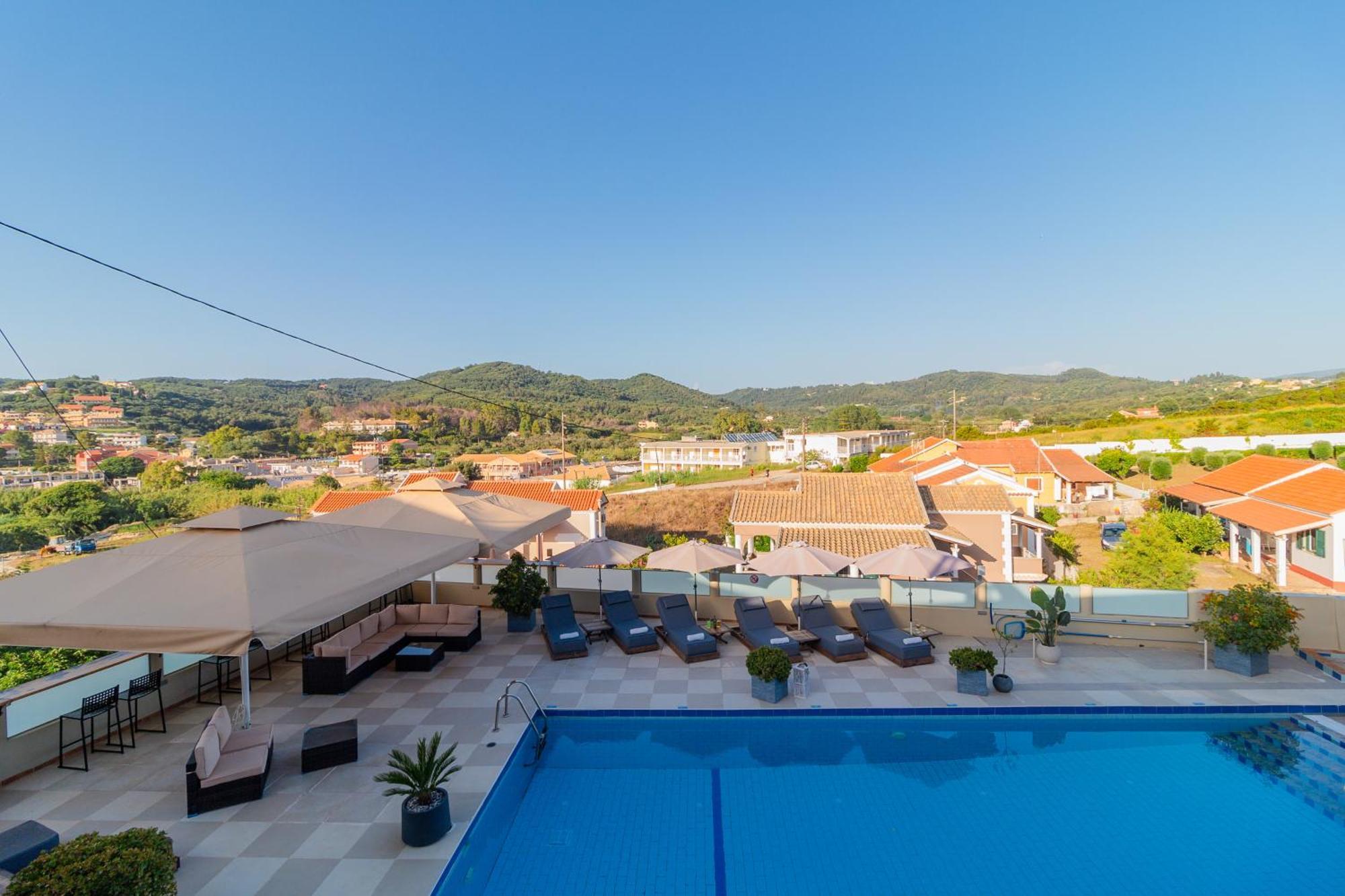 Sunsea Wellness Resort Агиос Стефанос Экстерьер фото
